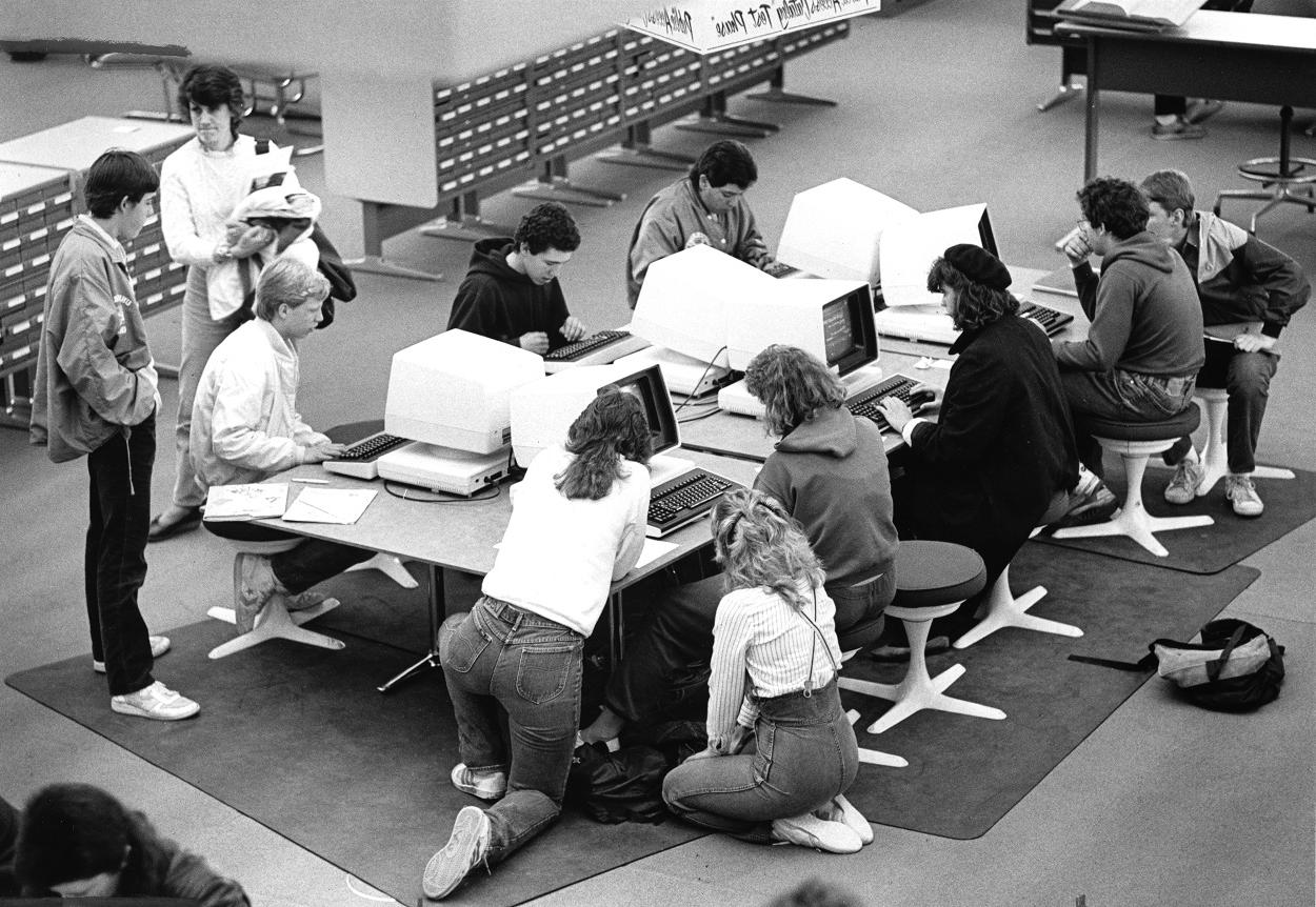 Archival image of students using computers in Michener Library